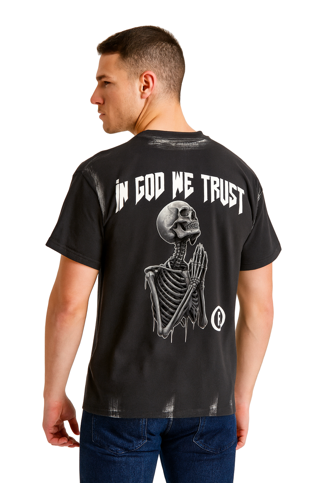 Man wearing a black t-shirt with a skeleton design and 'In God We Trust' text on the back.